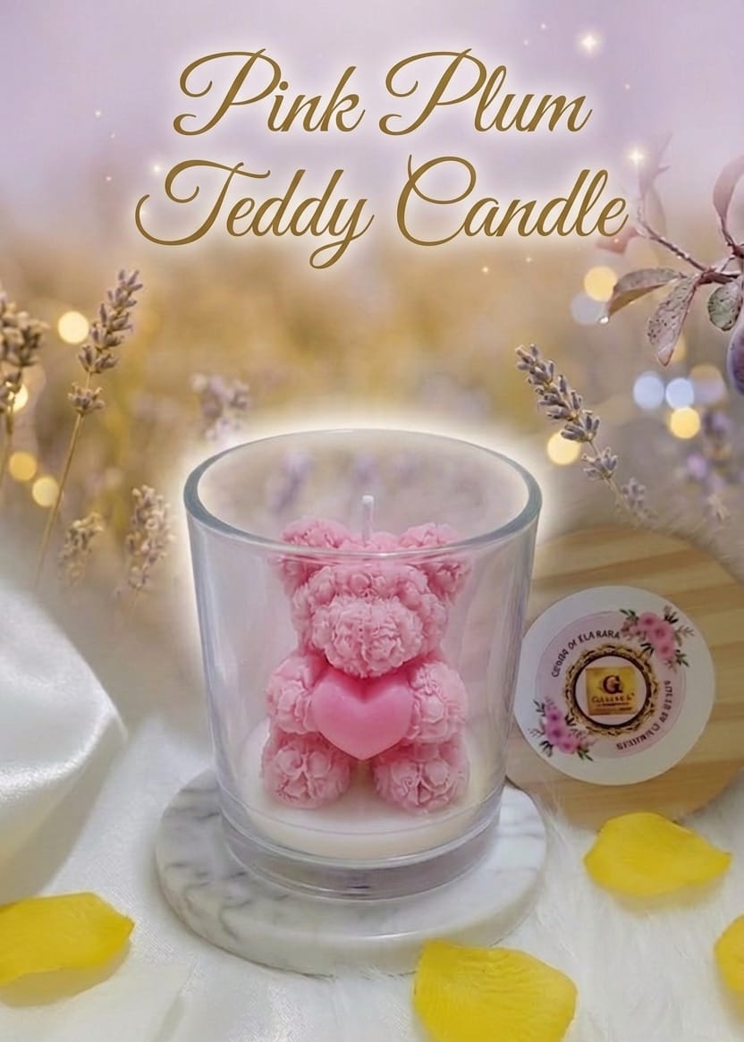 Pink teddy bear candle in a glass holder with decorative elements on a soft background