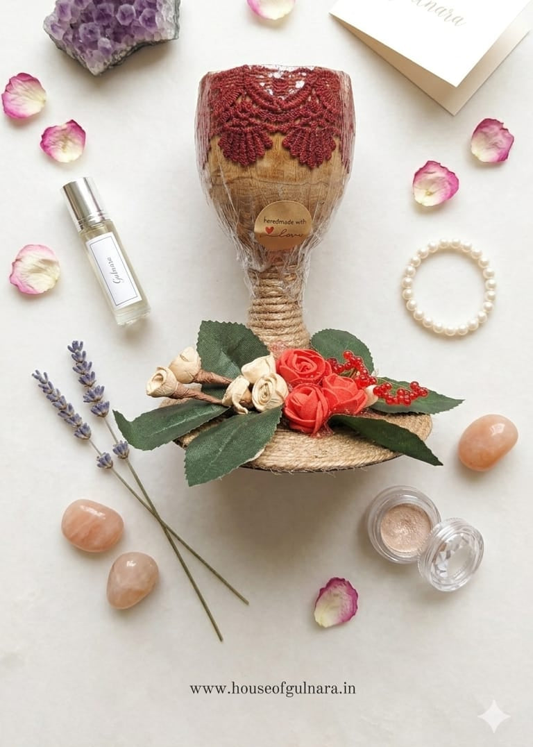Coconut shell candle on floral jute stand