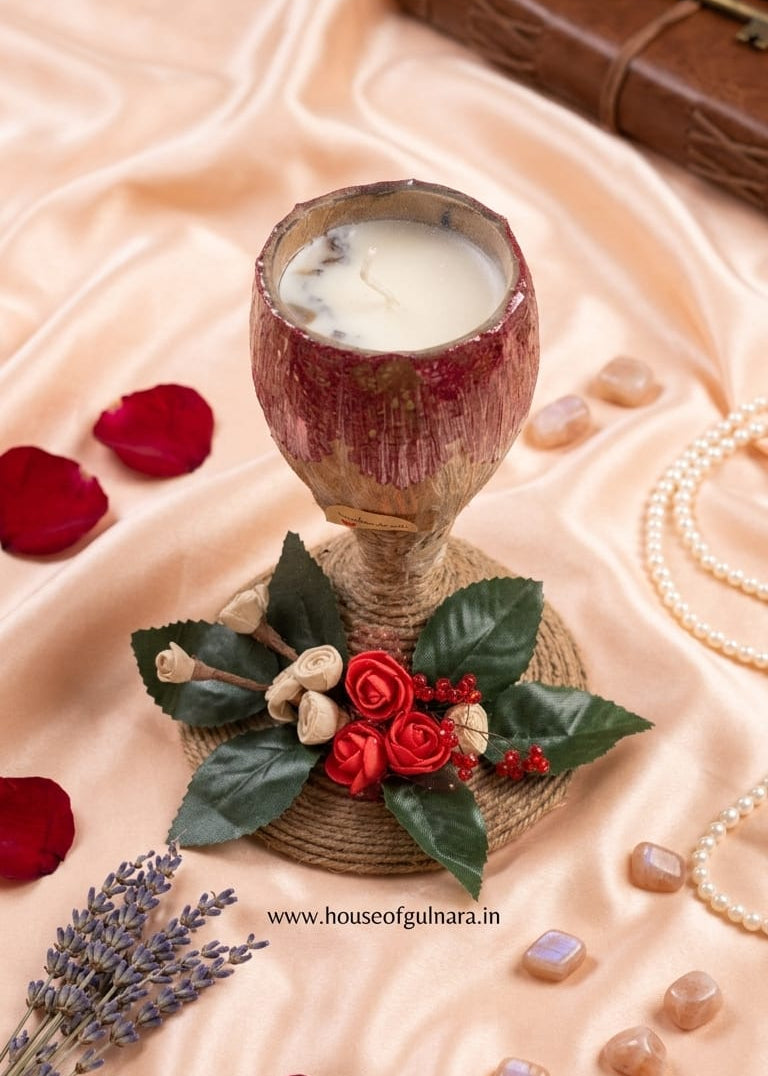 Coconut shell candle on floral jute stand