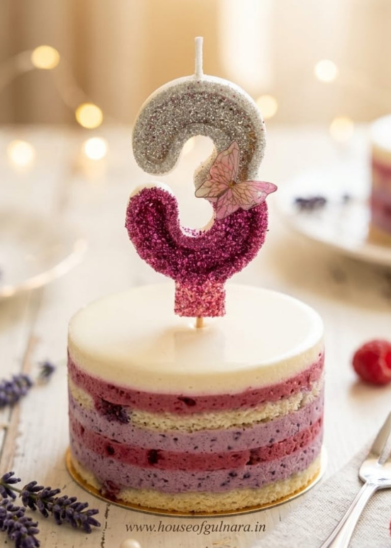 Small cake with a number 1 candle on a wooden table with a blurred background