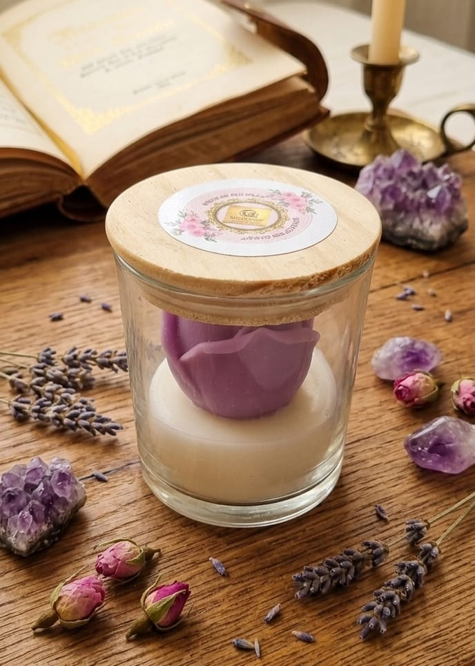 purple rose Glass jar with a wooden lid on a wooden surface with lavender flowers and crystals.