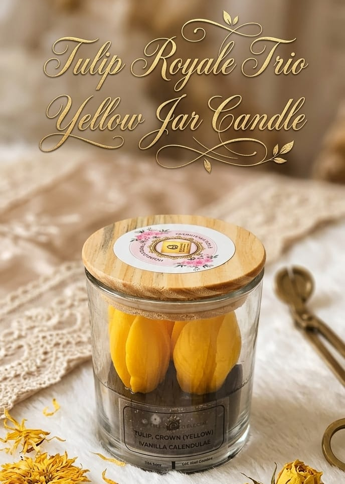 Yellow jar candle with wooden lid on a textured surface with dried flowers and a spoon.